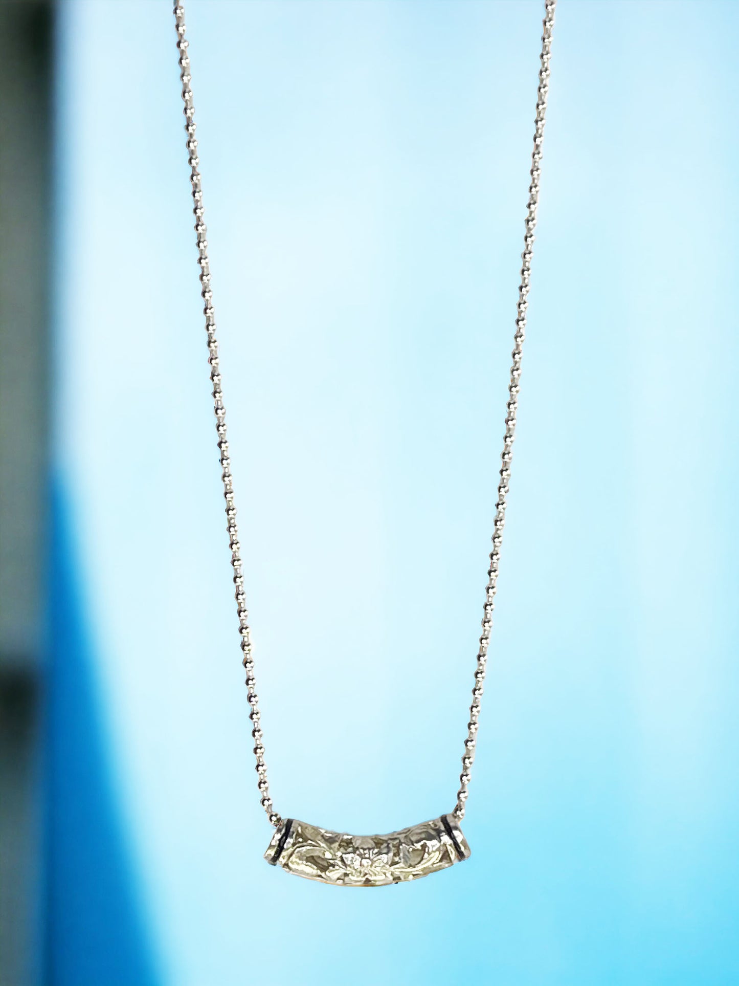 Collar con colgante deslizante